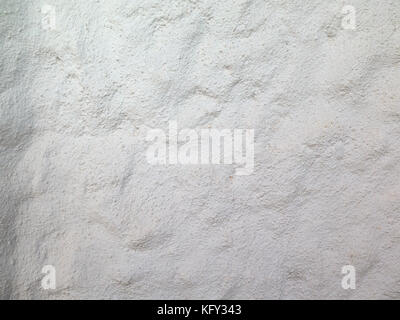Whitewashed stone wall texture background Stock Photo