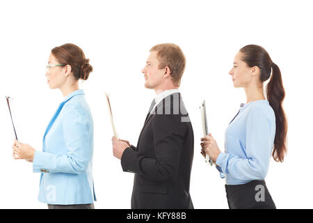 Portrait of three office workers standing one after another on white background Stock Photo
