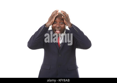 Portrait of African businessman in formal suit posing on white background Stock Photo