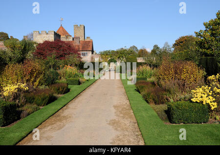 General view of Penshurst Place seen in autumn from its ornamental garden. Penshurst dates from the 14th century and is situated in the Weald of Kent. Stock Photo