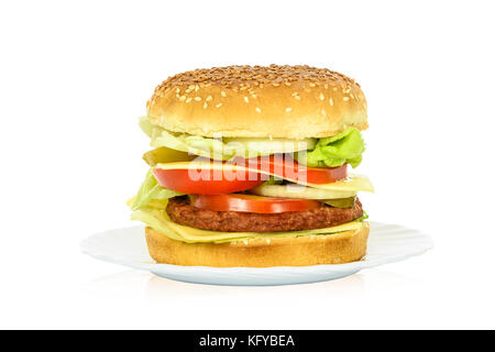 Tasty hamburger, beef burger in close-up on a plate and isolated on white background. Stock Photo