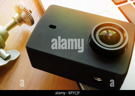 Action camera for vlog on a notebook. Video blogging concept. Stock Photo