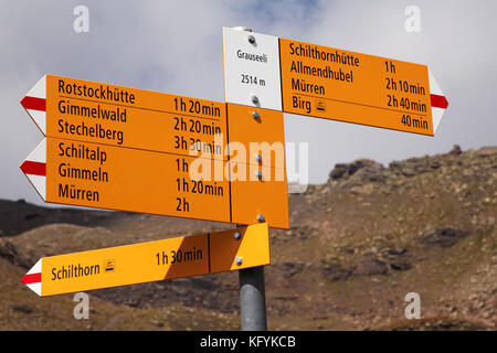 Mountain trail markers on Schilthorn mountain, Switzerland Stock Photo