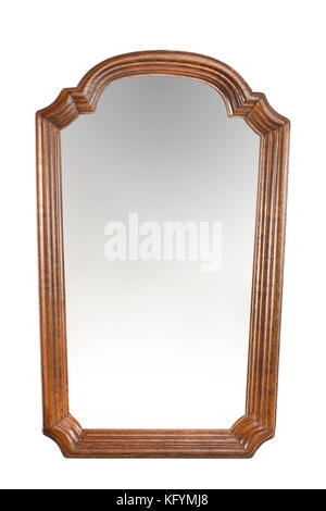 Antique mirror in wooden carved frame on the white background. Stock Photo