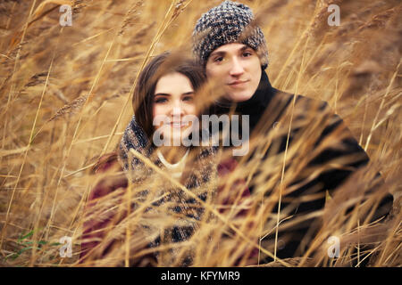 Happy young fashion couple walking outdoor Stock Photo