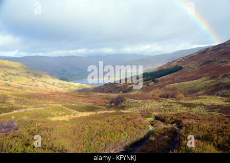 Rainbow in Glen Vorlich Looking Towards Ardvorlich House and Loch Earn from the Hill Walkers Path in Perthshire, Scottish Highlands, Scotland UK. Stock Photo