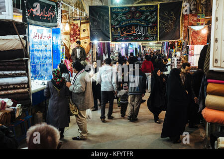 Shiraz, Iran - December 18, 2013. Lots of people and life at the night bazaar in Shiraz. Stock Photo