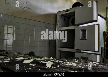 a shot of a refrigerator cell in a room of a morgue, inside an abandoned psychiatric hospital Stock Photo