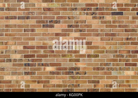 Tan and brown brick wall background Stock Photo