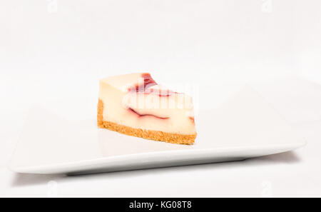 Cheesecake slice on white plate , isolated on white background Stock Photo