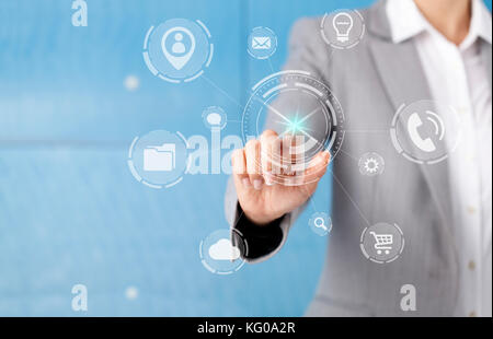 Businesswoman in front of visual touch screen. Stock Photo