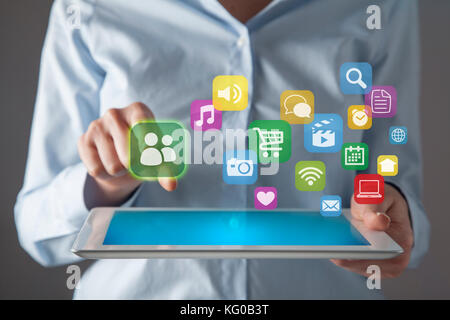 Businesswoman in front of visual touch screen. Stock Photo