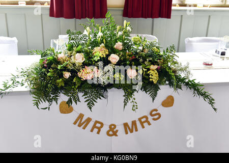 Wedding flowers at the wedding day reception UK Stock Photo