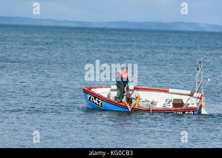 Fisherman Blue Boat Stuck On The Beach In Low Tide Period In Leigh On Sea Uk Stock Photo Alamy