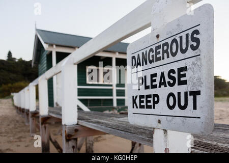 Dangerous sign on beach shack in portsea victoria Stock Photo