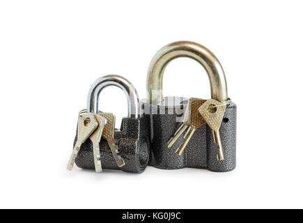 Keys attached with padlocks on white background. Isolated with clipping path Stock Photo