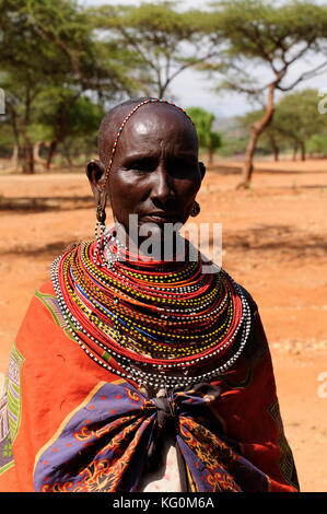 SOUTH HORR, KENYA - JULY 07: African woman from the Samburu tribe in the traditional dress in transit to the market in Kenya, South Horr in July 07, 2 Stock Photo