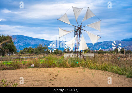 Water pumps driven by wind on the mountain plateau Lasithi in the inland of the island of Crete, Greece Stock Photo