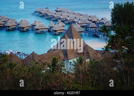 Bungalows over water in Moorea (Tahiti) French Polynesia Stock Photo