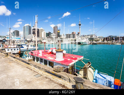 Viaduct harbour in the trendy Wynyard district in Auckland with the business district skyline and the sky tower in the background in New Zealand large Stock Photo