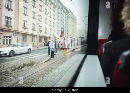 Prague, Czech Republic- October 18, 2017: People are waiting tram in the stop in Prague, Czech Republic Stock Photo