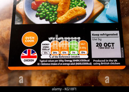 Close up of food label nutritional information & use by date on a pack of Sainsbury's chicken goujons Stock Photo