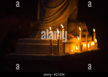 Dhaka, Bangladesh. 02nd Nov, 2017. Bangladeshi Christian devotees observe All Souls' Day, known as the Feast of All Souls, Commemoration of all the Faithful Departed in Dhaka, Bangladesh on 02nd November 2017.  On this day, Christians come to the graveyard and pray for the departed souls of their loved ones..All Soul's Day is a Roman Catholic day of remembrance for friends and loved ones who have passed away. This comes from the ancient Pagan Festival of the Dead, which celebrated the Pagan belief that the souls of the dead would return for a meal with the family. Credit: zakir hossain chowdhu Stock Photo