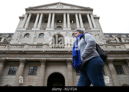 London, UK. 02nd Nov, 2017. A woman walks past the Bank of England.  The Bank of England raised interest rates from 0.25 per cent to 0.5 per cent. The members of the Bank’s monetary policy committee, including the governor, Mark Carney, voted to increase the cost of borrowing by seven to two. This is the first increase for more than a decade. Credit: Dinendra Haria/Alamy Live News Stock Photo