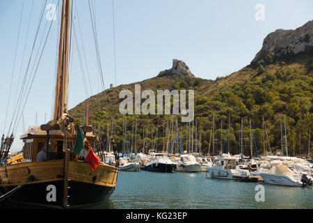 Marina di Piccolo, next to Poetto beach, Cagliari, Sardinia, Italy. The 1911 Andreola in the the foreground Stock Photo