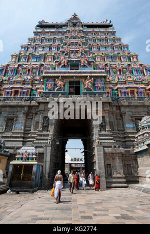 Pilgrims entering outer goparam of Thillai Nataraja Temple, dedicated to Nataraj, dancing form of Shiva, Chidambaram, Tamil Nadu, India, Asia Stock Photo