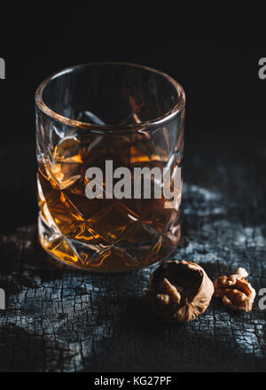 Old fashioned cocktail on  dark background, vertical close-up Stock Photo