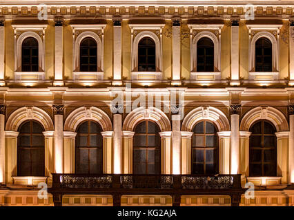 St. Petersburg, Russia - May 31, 2016: Several windows in a row and balcony on nignt illuminated facade of N.I.Vavilov Institute of Plant Genetic Reso Stock Photo
