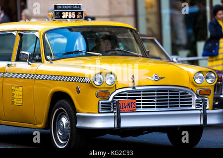 New York 1980s Yellow Checkers Taxi Stock Photo