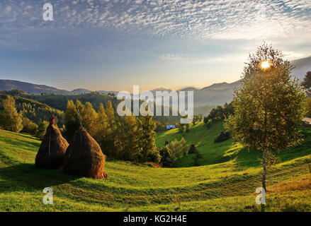 Amazing landscape at sunrise in Transylvania Romania Autumn panorama Stock Photo