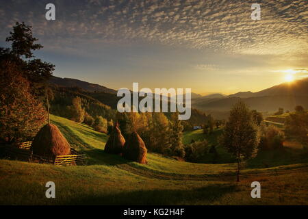 Amazing landscape at sunrise in Transylvania Romania Autumn panorama Stock Photo