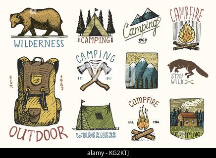 set of engraved vintage, hand drawn, old, labels or badges for camping, hiking, hunting with mountains, campfire and tent, axes. bear and backpack, wolf or red fox. Stock Vector