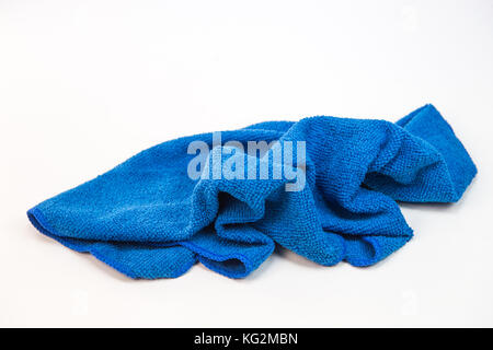 Crumpled blue microfiber cloth isolated on white background Stock Photo