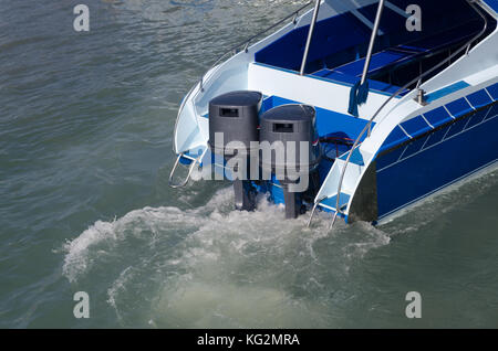 Boat engines tune up  rear view of speed boat running. Stock Photo