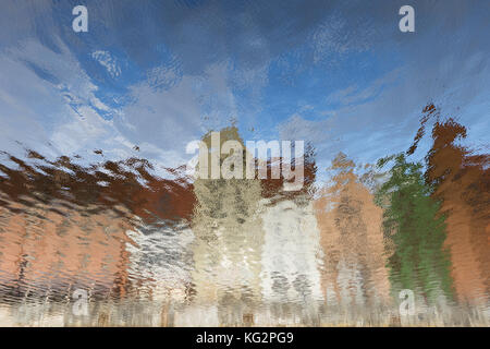 Abstract reflections of Main Town's old colorful buildings on the Motlawa River in Gdansk, Poland. Stock Photo