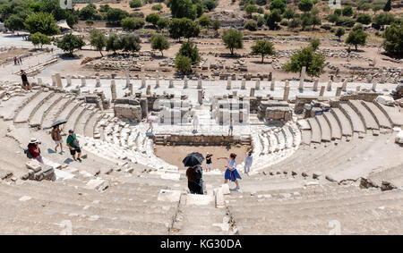 People visit Odeon (Bouleuterion) at ancient ruins at Ephesus historical ancient city, in Selcuk,Izmir,Turkey:20 August 2017 Stock Photo