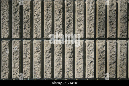 close up Abstract grey brown tiled wall texture background. Stock Photo