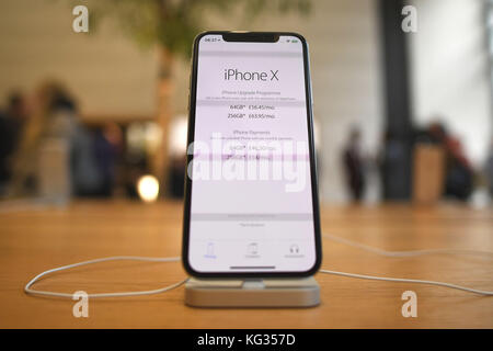 An iPhone X on display in the Apple Store on Regent Street, London, as the new handset went on-sale in the UK. Stock Photo