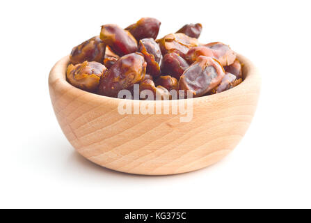 Sweet dates without stones in bowl isolated on white background. Stock Photo