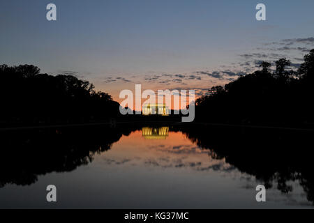 Sunset over the Reflecting Pool and the Lincoln Memorial, Washington DC, United States of America. Stock Photo