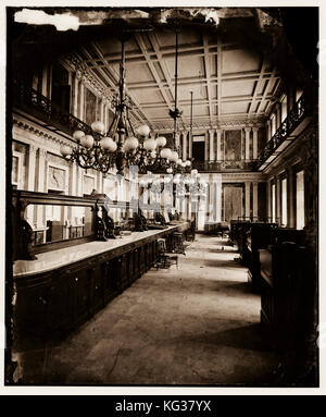 TITLE:  Treasury Dept. in Lincoln's time - cash room - behind the desks RIGHTS INFORMATION:  No known restrictions on publication. MEDIUM:  1 negative : glass, wet collodion. CREATED/PUBLISHED:  [between 1860 and 1880] Stock Photo