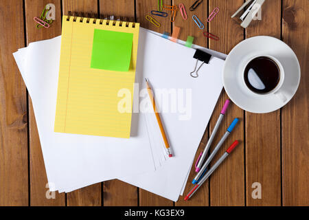 Directly above view of a old wooden table, various objects on it. Stock Photo