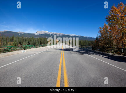 an overpass over the Athabasca River in the Canadian Rocky mountains Stock Photo