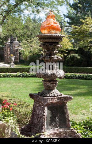 Tiffany giant glass torch 'flame' in front of John D. Rockefeller's Kykuit estate. Torch is similar to the Standard Oil logo (founded by Rockefeller). Stock Photo