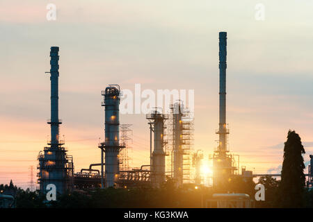 Landscape of oil refinery industry with oil storage tank in night. Stock Photo