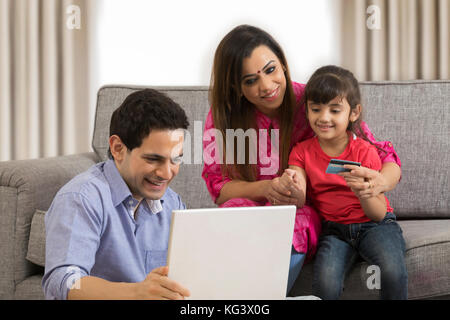 Family shopping online Stock Photo